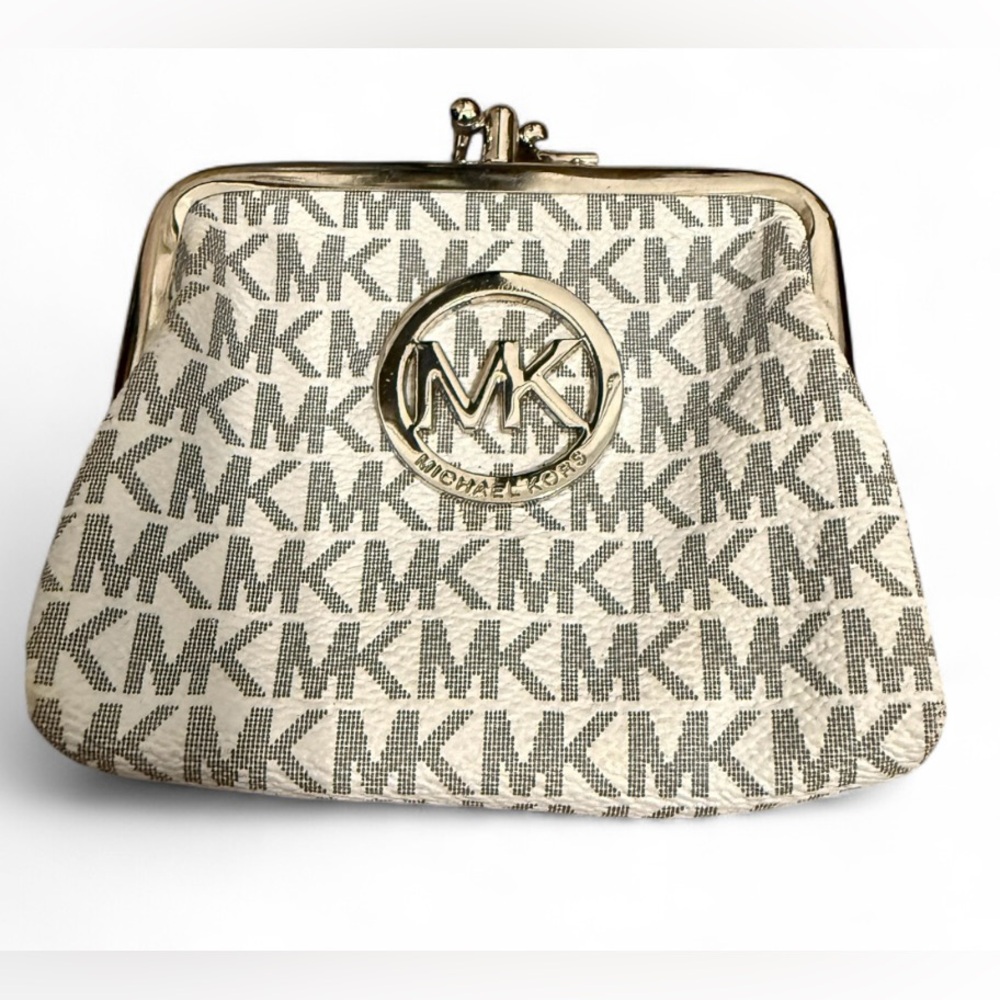 Michael Kors signature white and gray change purse with a clasp closure